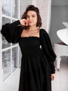 Модное нарядное платье черного цвета с пышным рукавом