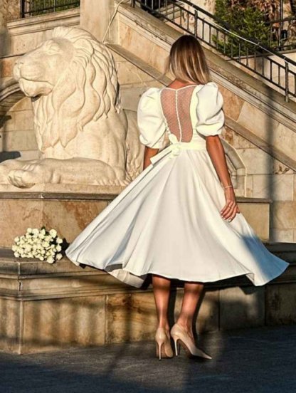 Elegant milky midi dress with a chic back and puffy sleeves, фото 1