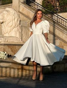 Elegant milky midi dress with a chic back and puffy sleeves