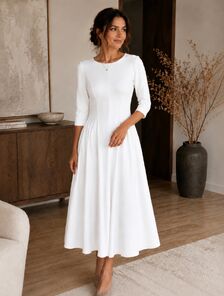 Белое праздничное платье миди А-силуэта с карманами и расклешенной юбкой