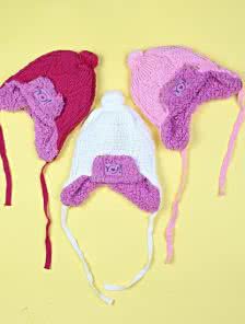 Теплая шапочка для девочки в розовом цвете